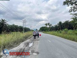 Unit Lantas Polsek Tualang Intensifkan Patroli di Jalan Rusak untuk Jaga Keselamatan Warga
